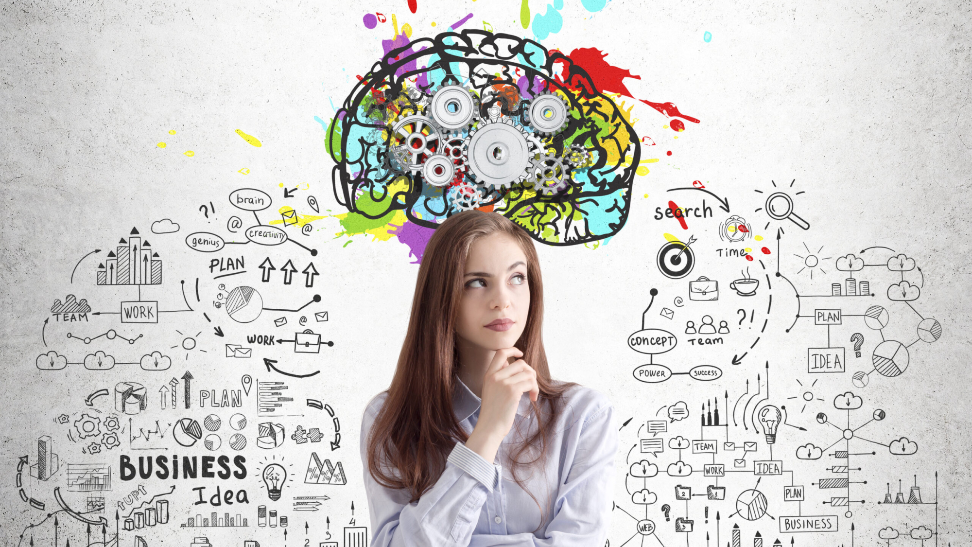 Portrait of a thoughtful young brunette woman in a purple shirt standing near a concrete wall with a colorful brain sketch with gears on top of it.